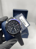 Tommy Hilfiger black gold-tone skeleton watch