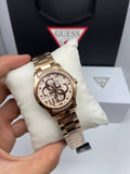 Guess rose gold-tone crystal logo watch