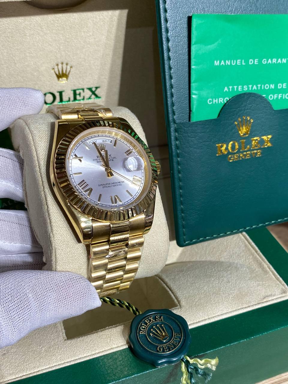 Gold-tone day/date automatic watch, silver Roman dial