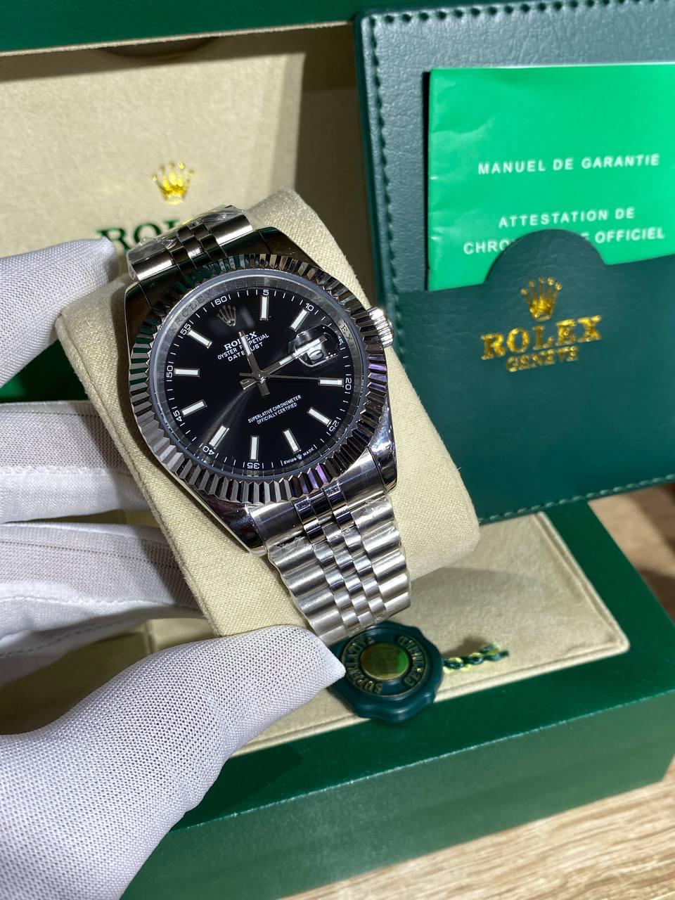 Steel automatic watch, black dial, fluted bezel, jubilee bracelet