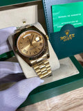 Gold-tone day/date automatic watch, champagne Roman dial