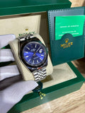 Steel automatic watch, blue dial, fluted bezel, jubilee bracelet