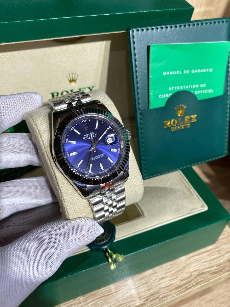 Steel automatic watch, blue dial, fluted bezel, jubilee bracelet
