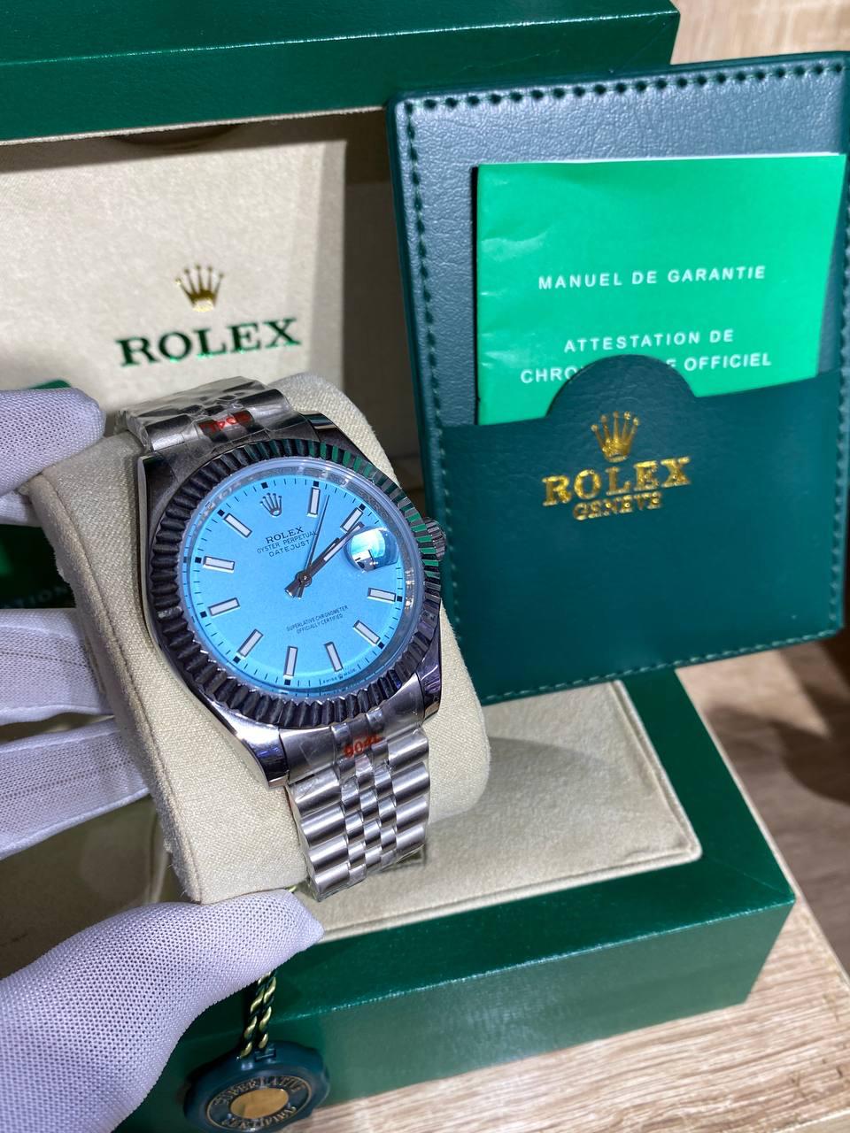 Steel automatic watch, ice-blue dial, fluted bezel, jubilee bracelet