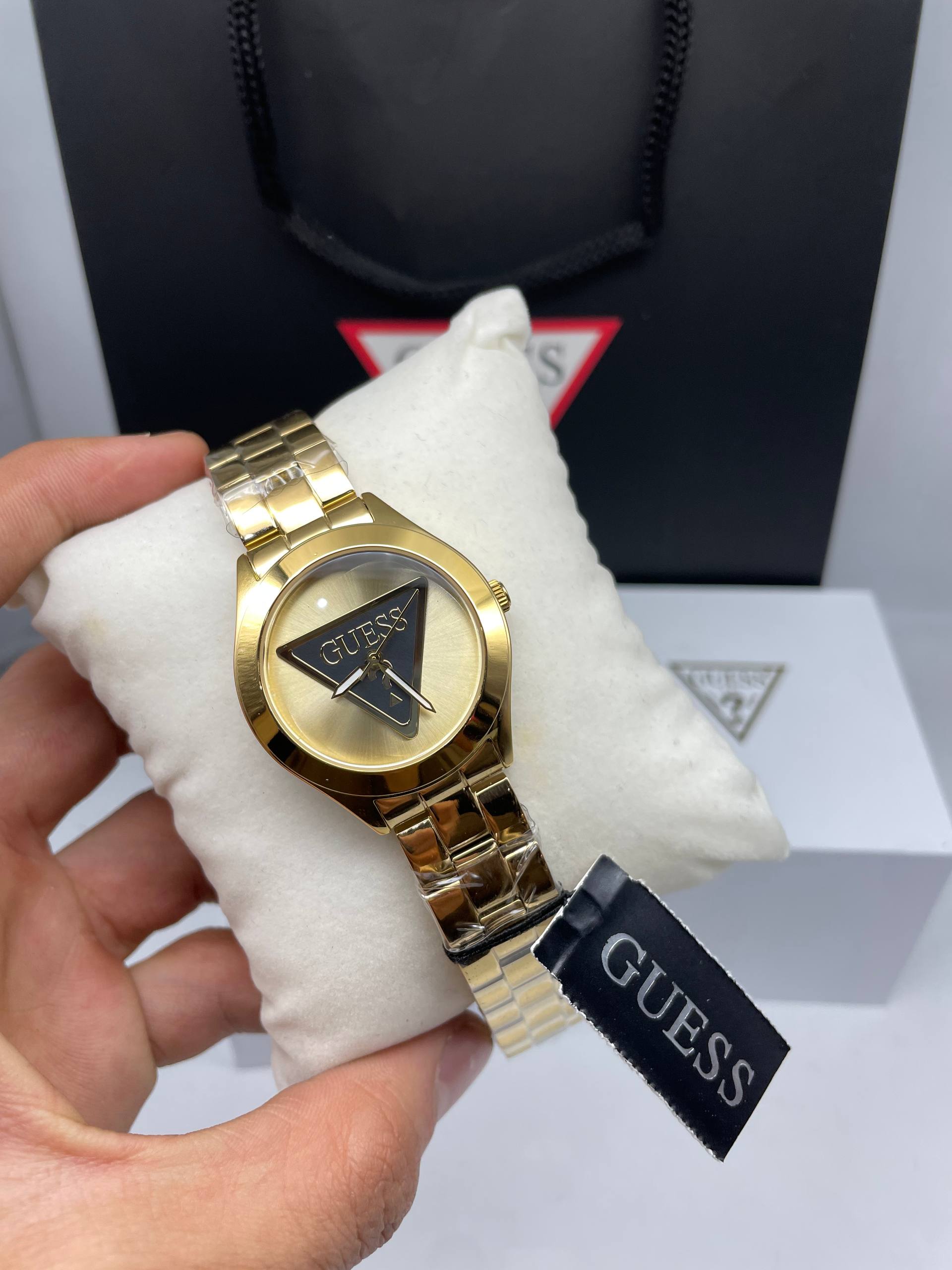 Guess gold-tone triangle logo watch