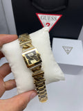 Guess gold-tone square crystal dress watch