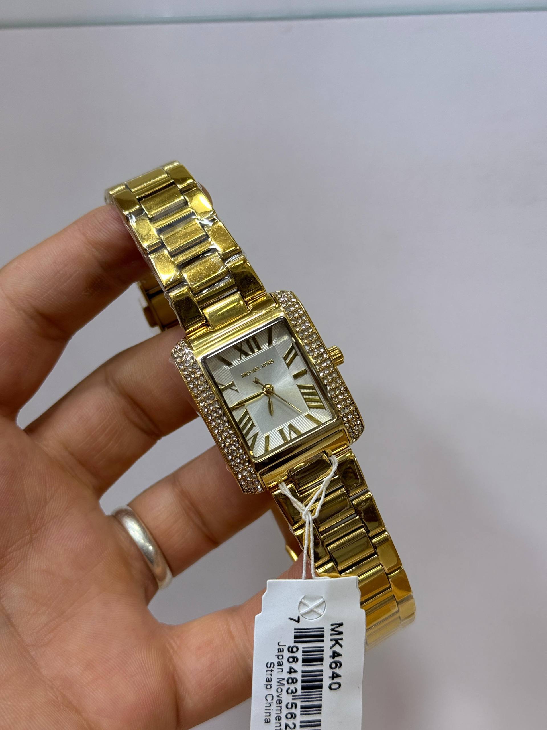 Michael Kors gold-tone rectangular crystal watch